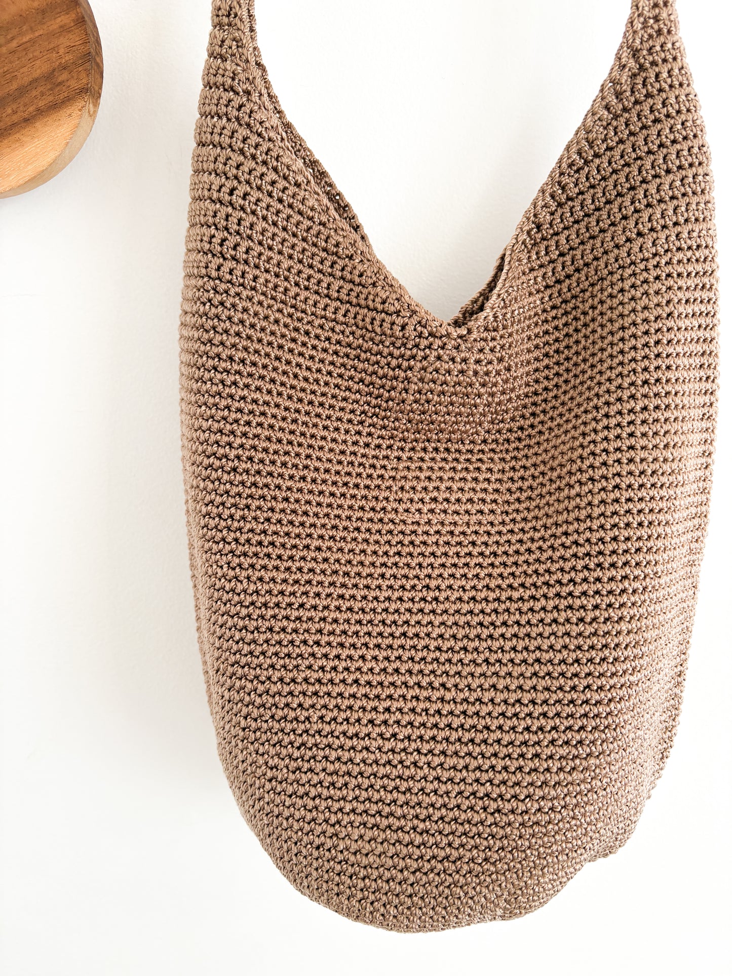 tan woven handbag