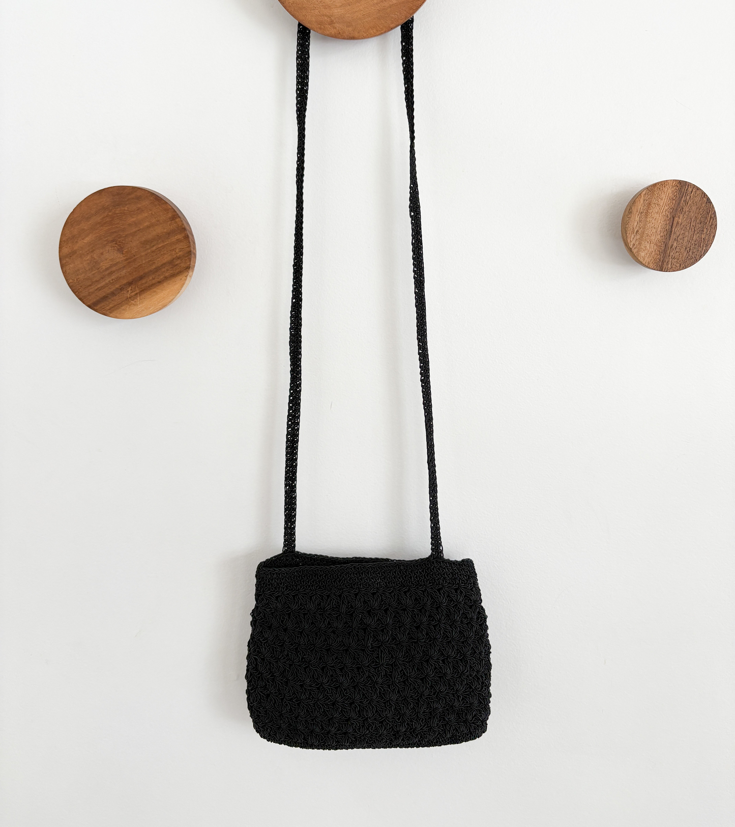 black woven crossbody