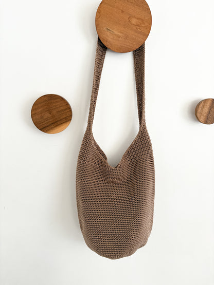 tan woven handbag