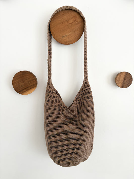 tan woven handbag